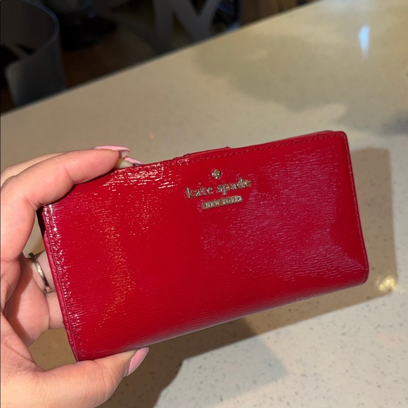 kate spade Handbags - Kate Spade Cedar Street Lacey Patent
Leather Red Wallet 🔴pre-owned